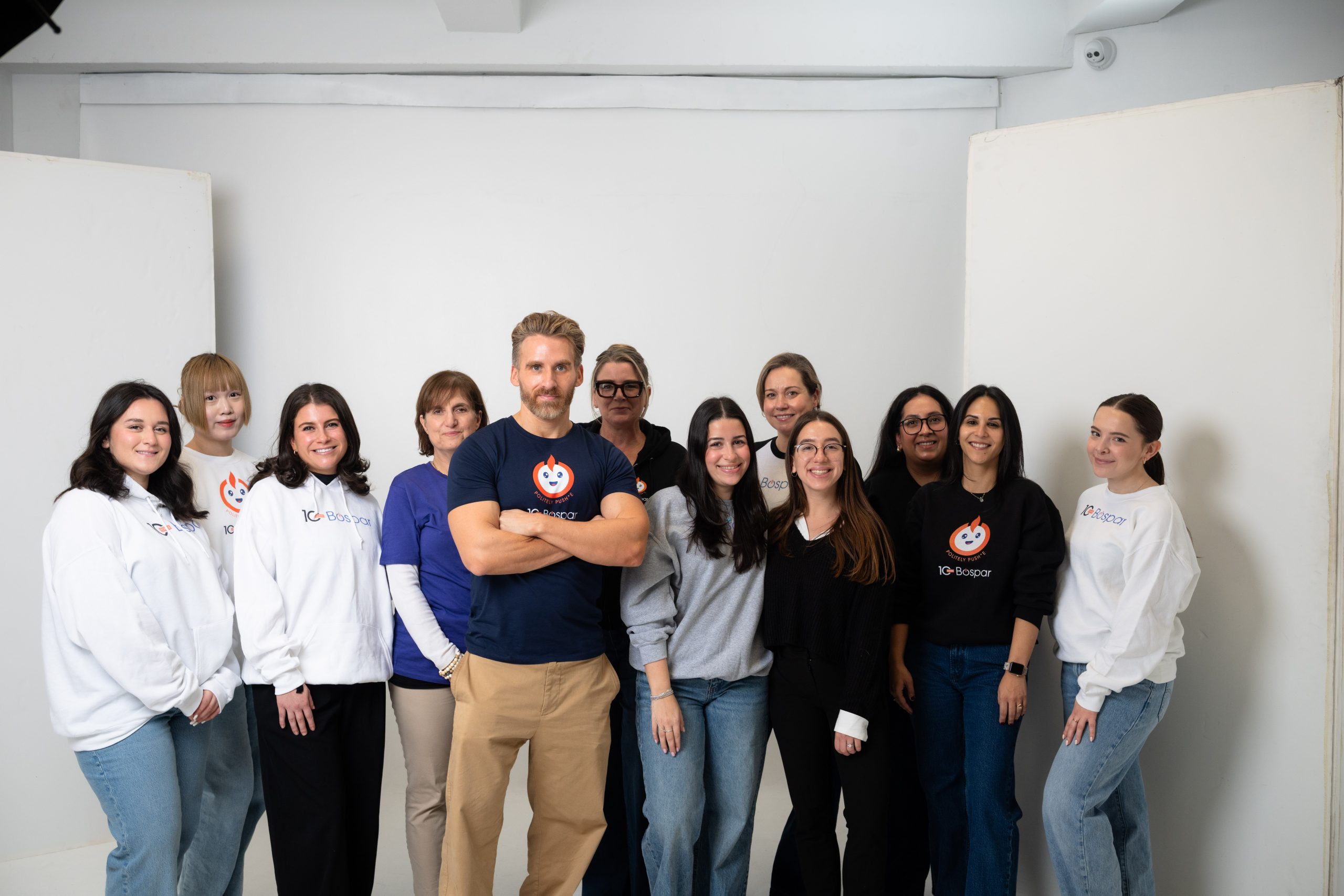 Bospar New York team in white studio celebrating 10 year anniversaory